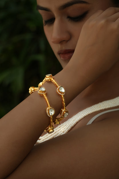 Vasundhra gold Polki bridal bangles with uncut stones – handcrafted Indian jewellery
