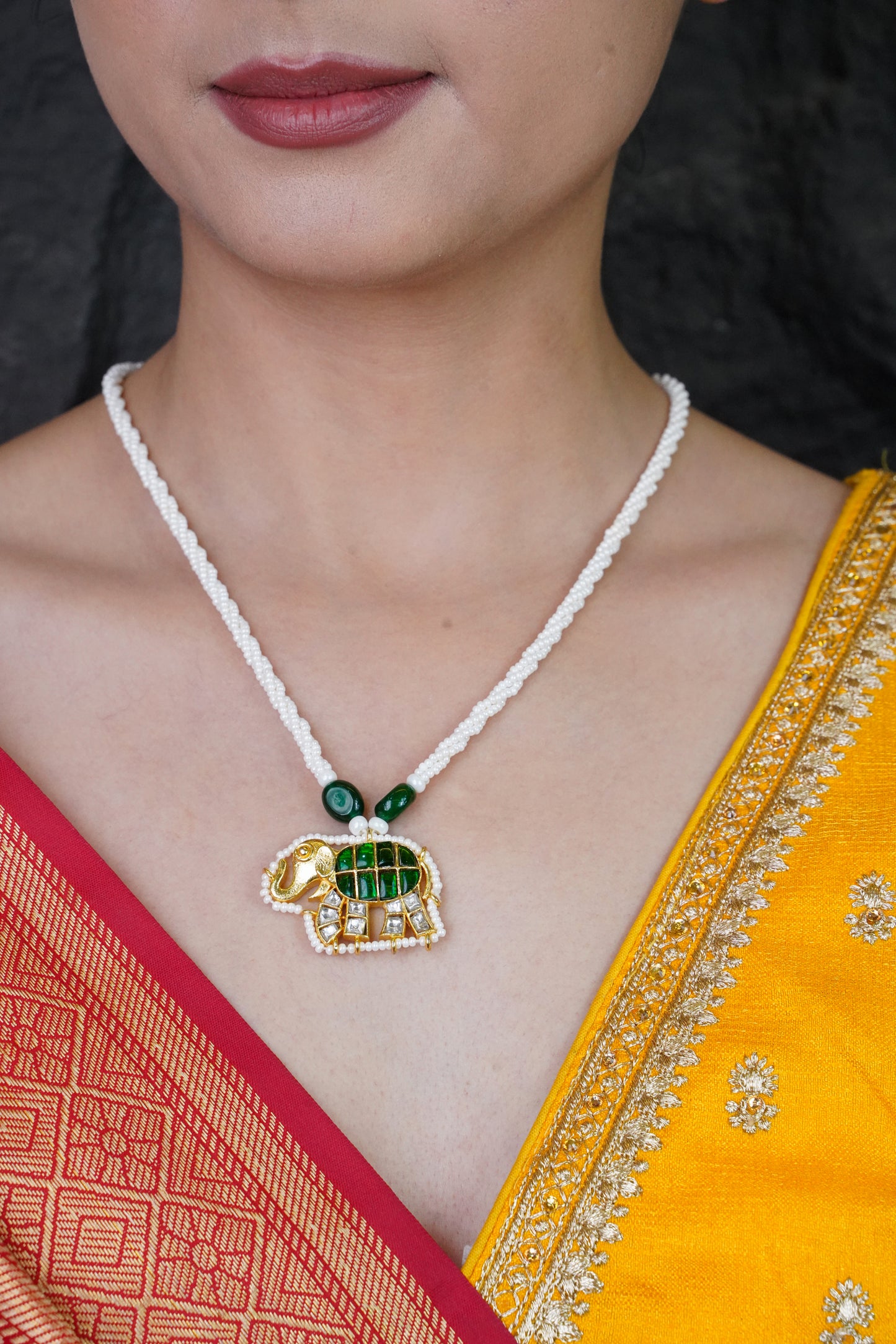 Rajsi gajmukhta green pearl kundan necklace