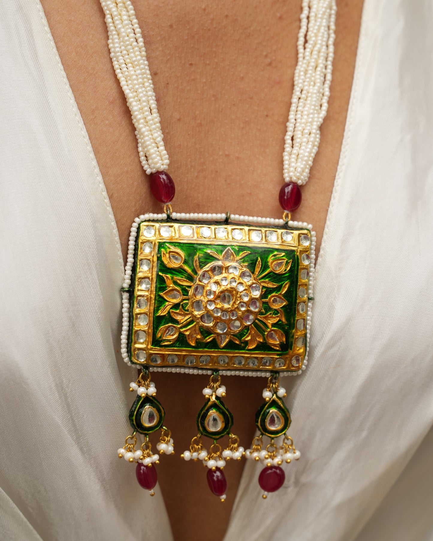 Avika emerald green and red reversable meenakari necklace set