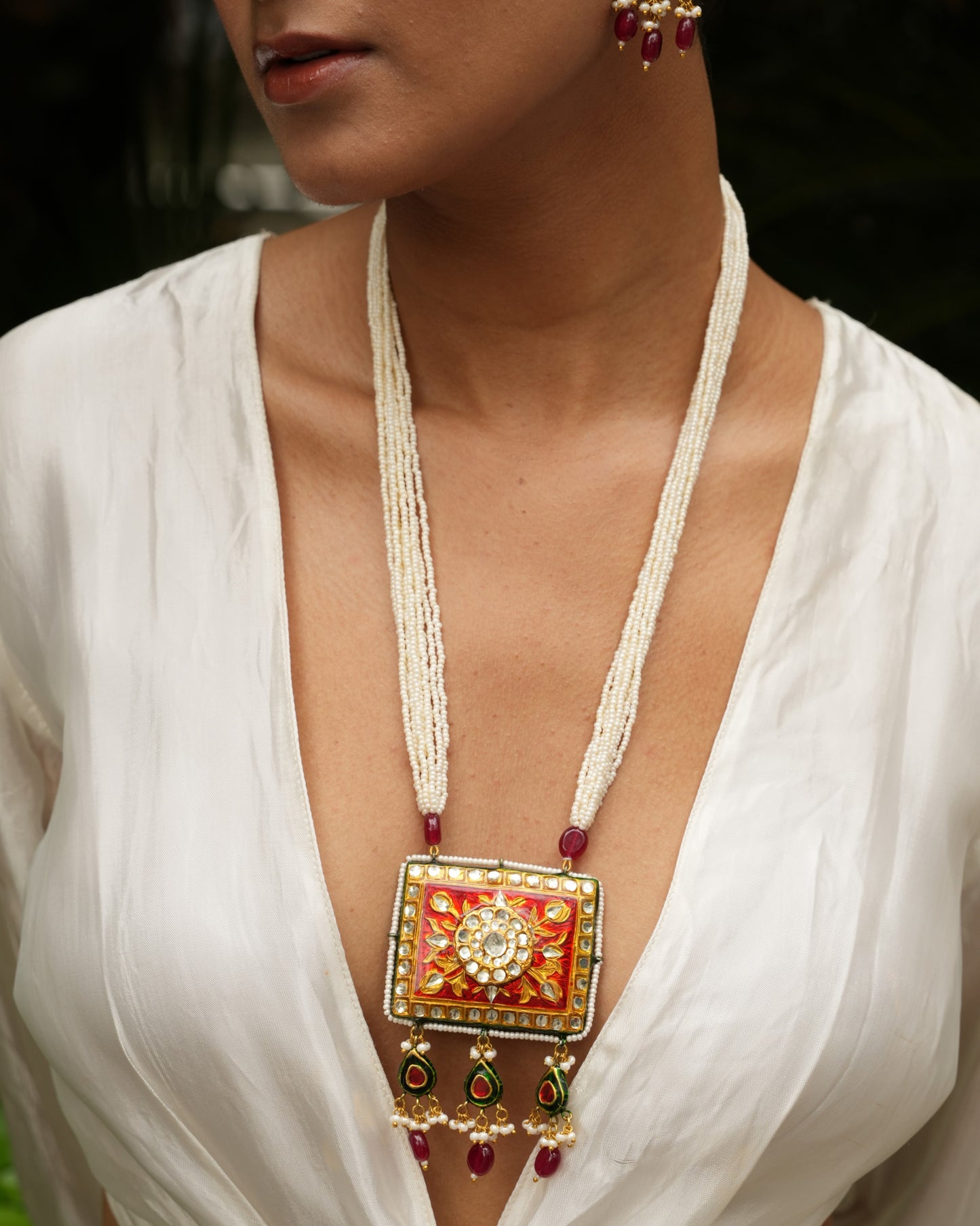 Avika emerald green and red reversable meenakari necklace set