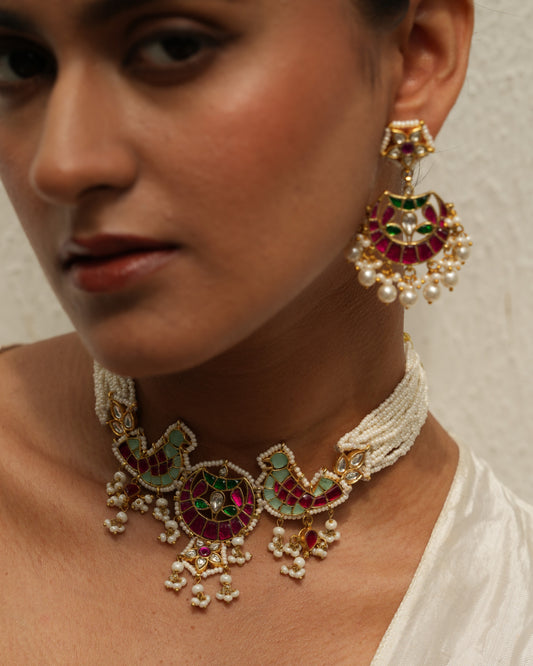 Ahilya pink and green bird motif kundan choker set with gold plating
