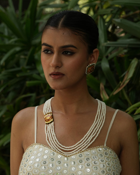 Kumudini white pearl necklace with meenakari kundan brooch and matching earrings – handcrafted Indian jewellery

