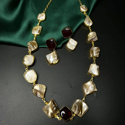 Zuri mother of pearl necklace set with ruby stone